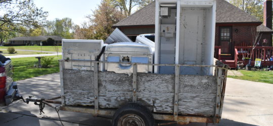 A trailer hauling scrap metal.
